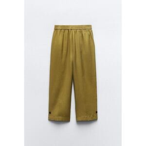 CUFFED TAPERED PANTS WITH BUTTON STRAPS